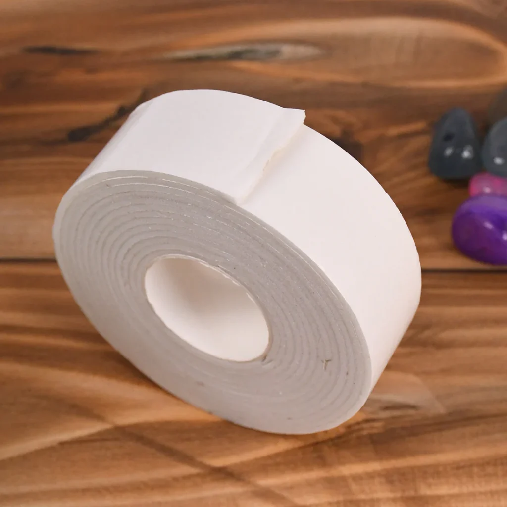Double sided foam mounting tape offers a strong adhesive solution perfect for mounting heavy frames, posters, and decorations securely on walls without damaging paint.
