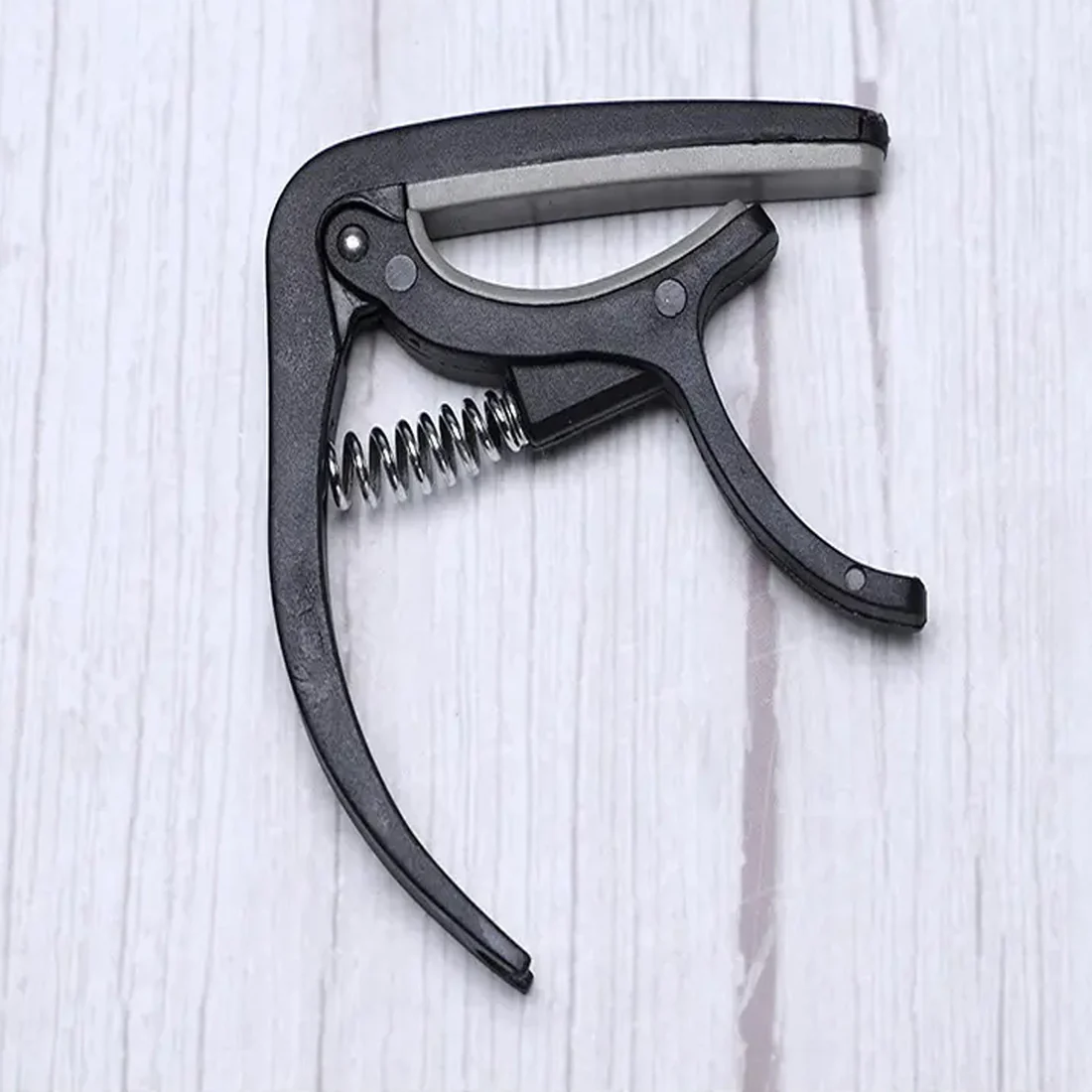 Elevate your musical performance with the Wagtail Guitar Capo, an essential accessory for every musician in India