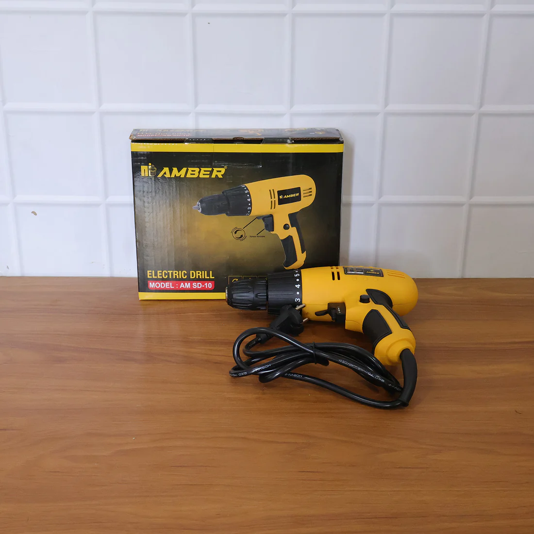 The electric drill machine 280W is a compact and powerful handheld tool designed for efficient drilling and fastening across various materials.