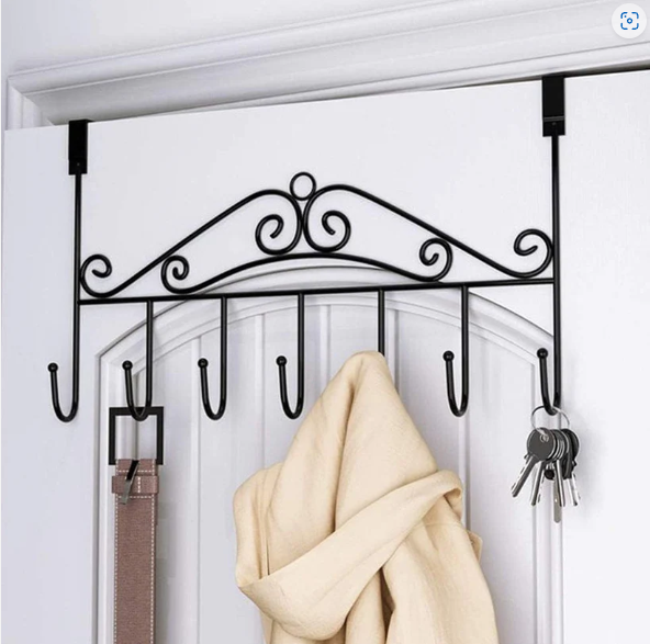 Transform your living space with our versatile Over Door Hanger Rack, designed to bring instant organisation and style to any room. Perfect for decluttering bedrooms, bathrooms, and hallways, this sturdy metal hanging rack offers a smart, space-saving storage solution without the need for drilling or complex installation. Simply hang it over any standard door and enjoy the convenience of seven robust hooks, ready to hold everything from coats and hats to bags and towels. Experience a tidier home with this elegant and functional organizer from Indo Glow.