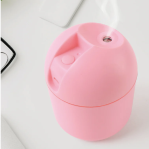 Travel-friendly USB powered mini air humidifier for personal use USB Mini Air Humidifier on desk emitting cool mist with soft LED light Portable USB Mini Air Humidifier in use providing cool mist for dry air relief Video demonstration showing USB Mini Air Humidifier operation and mist output Video demonstration showing USB Mini Air Humidifier operation and mist output Compact Mini Air Humidifier releasing soothing cool mist Travel-friendly USB powered mini air humidifier for personal use USB Humidifier placed on office desk improving air quality Close-up of USB Mini Air Humidifier with glowing LED night light USB Mini Air Humidifier – Portable 250ml Quiet Cool Mist with LED