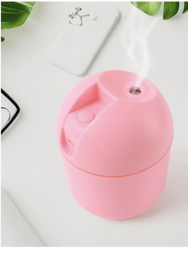 Travel-friendly USB powered mini air humidifier for personal use USB Mini Air Humidifier on desk emitting cool mist with soft LED light Portable USB Mini Air Humidifier in use providing cool mist for dry air relief Video demonstration showing USB Mini Air Humidifier operation and mist output Video demonstration showing USB Mini Air Humidifier operation and mist output Compact Mini Air Humidifier releasing soothing cool mist Travel-friendly USB powered mini air humidifier for personal use USB Humidifier placed on office desk improving air quality Close-up of USB Mini Air Humidifier with glowing LED night light USB Mini Air Humidifier – Portable 250ml Quiet Cool Mist with LED