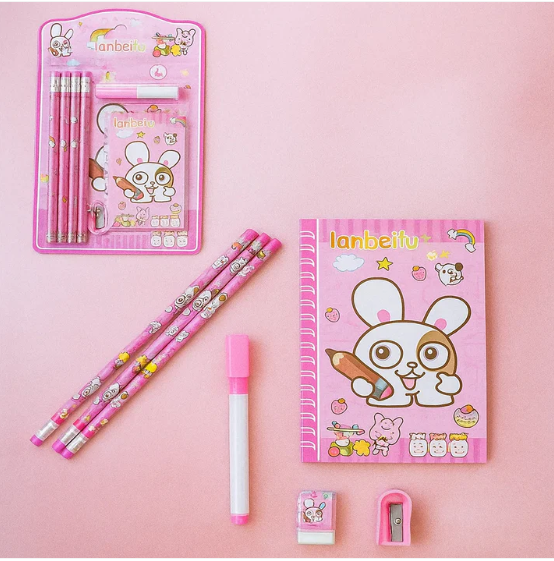Kids' Stationery Kit featuring a diary, pencils, and an eraser. Complete Kids' Stationery Kit with a fun cartoon theme. Close-up of the cartoon-themed Kids' Stationery Kit components. Detailed view of the wooden pencils and sharpener from the Kids' Stationery Kit. Kids' Stationery Kit featuring a diary, pencils, and an eraser. The 8-piece Kids' Stationery Kit displayed with all its contents. Complete Kids' Stationery Kit for school, including pencils, sharpener, and eraser. Wooden pencils, eraser, sharpener, and diary from the Kids' Stationery Kit. Full 8-piece Kids' Stationery Kit featuring a diary and wooden pencils. Kids' Stationery Kit highlighting wooden pencils, sharpener, and eraser. Various components of the Kids' Stationery Kit, including pencils and sharpener. The 8-piece Kids' Stationery Kit contents, including diary and sharpener. Close-up of wooden pencils, sharpener, eraser, and diary from the Kids' Stationery Kit. Packaging of the Kids' Stationery Kit, ideal for a birthday return gift. Kids' Stationery Kit – 8 Pc School Supply Set | ScribbleJoy