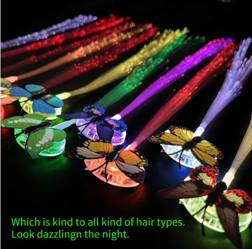 LED butterfly hair braid clip glowing in party light with fiber optic strands LED butterfly hair braid clip glowing in party light with fiber optic strands Chic glowing butterfly hair clip accessory with LED lights Twinkling LED butterfly hair braid clip glowing at night Festive light-up butterfly hairpin clip illuminating hair Colorful LED butterfly hair braid clip in vibrant colors Night glow from butterfly LED hair clip shining brightly Close-up of vibrant LED butterfly hair braid clip design LED butterfly hair clip showing glowing fiber optic strands LED butterfly hair braid clip party accessory with lights LED Butterfly Hair Braid Clip – Light-Up Party Accessory - Image 4