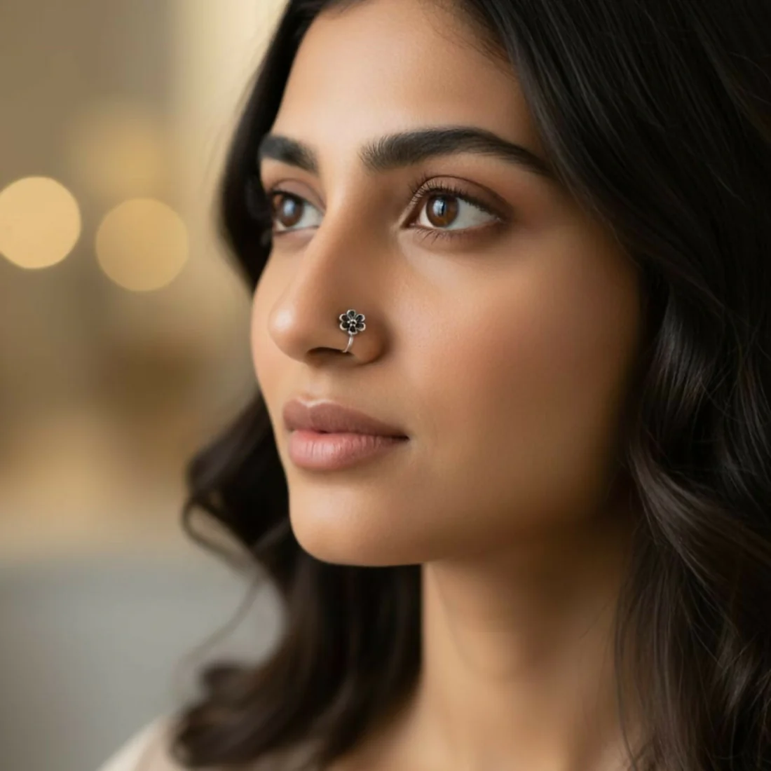 Discover the charm of our oxidized silver designer nose pins, specially crafted in a pack of 5 to enhance your ethnic beauty with elegance and style. Each nose pin features a unique design inspired by floral, geometric, and textured motifs that offer a rich antique silver finish, perfect for women and girls who appreciate minimal yet classy traditional jewelry. Made from premium quality oxidized alloy, these nose pins are lightweight, skin-friendly, and provide a comfortable fit for all-day wear. Whether for daily use, festive occasions, weddings, or gifting, these lightweight, comfortable nose pins securely grip and complement both ethnic and fusion outfits beautifully.